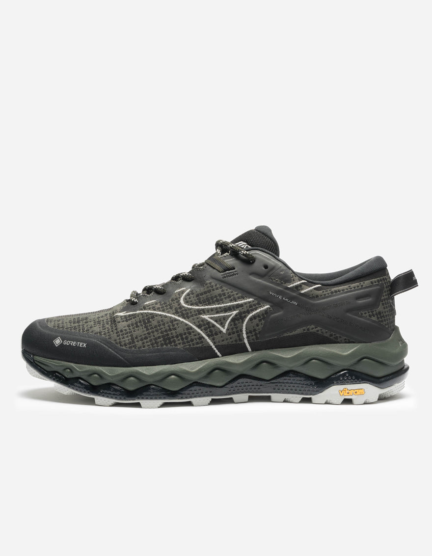 Gray and black running shoe on a white background