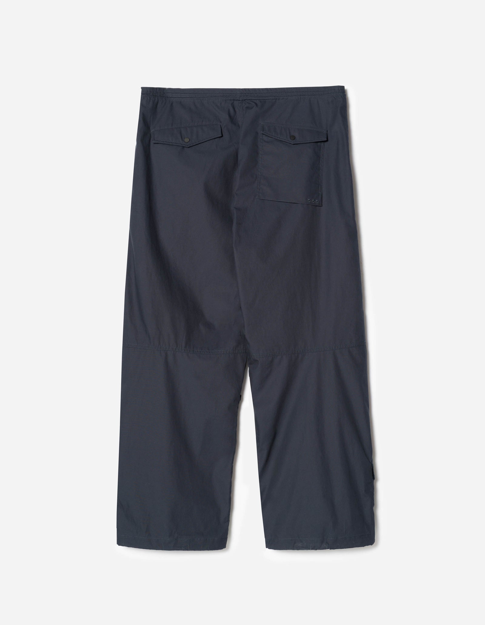 Dark gray pants on a light gray background