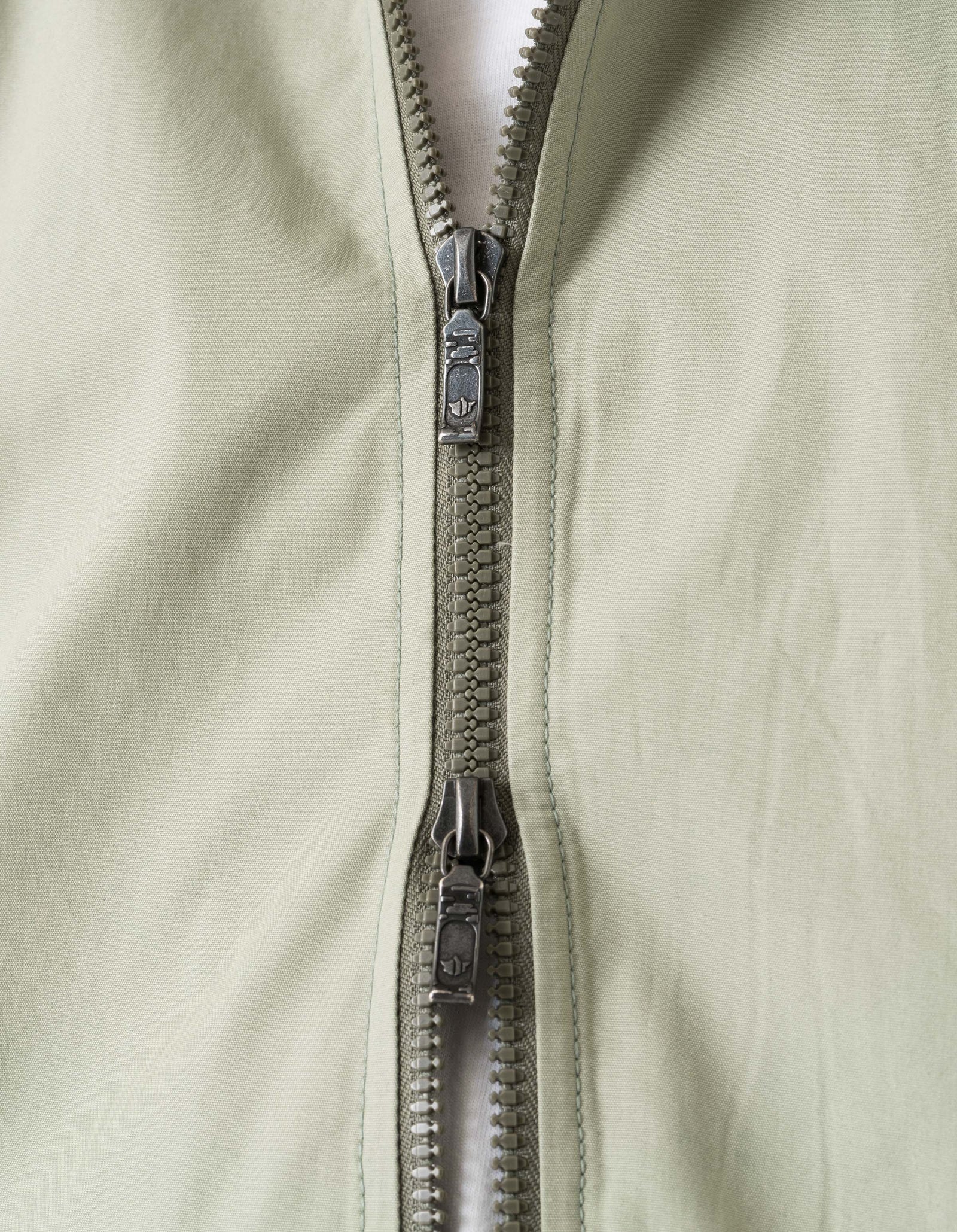 7211 Asym Woven Track Top Sage